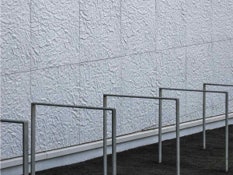 Photo #3 of project A library's facade covered in paper-like texture
