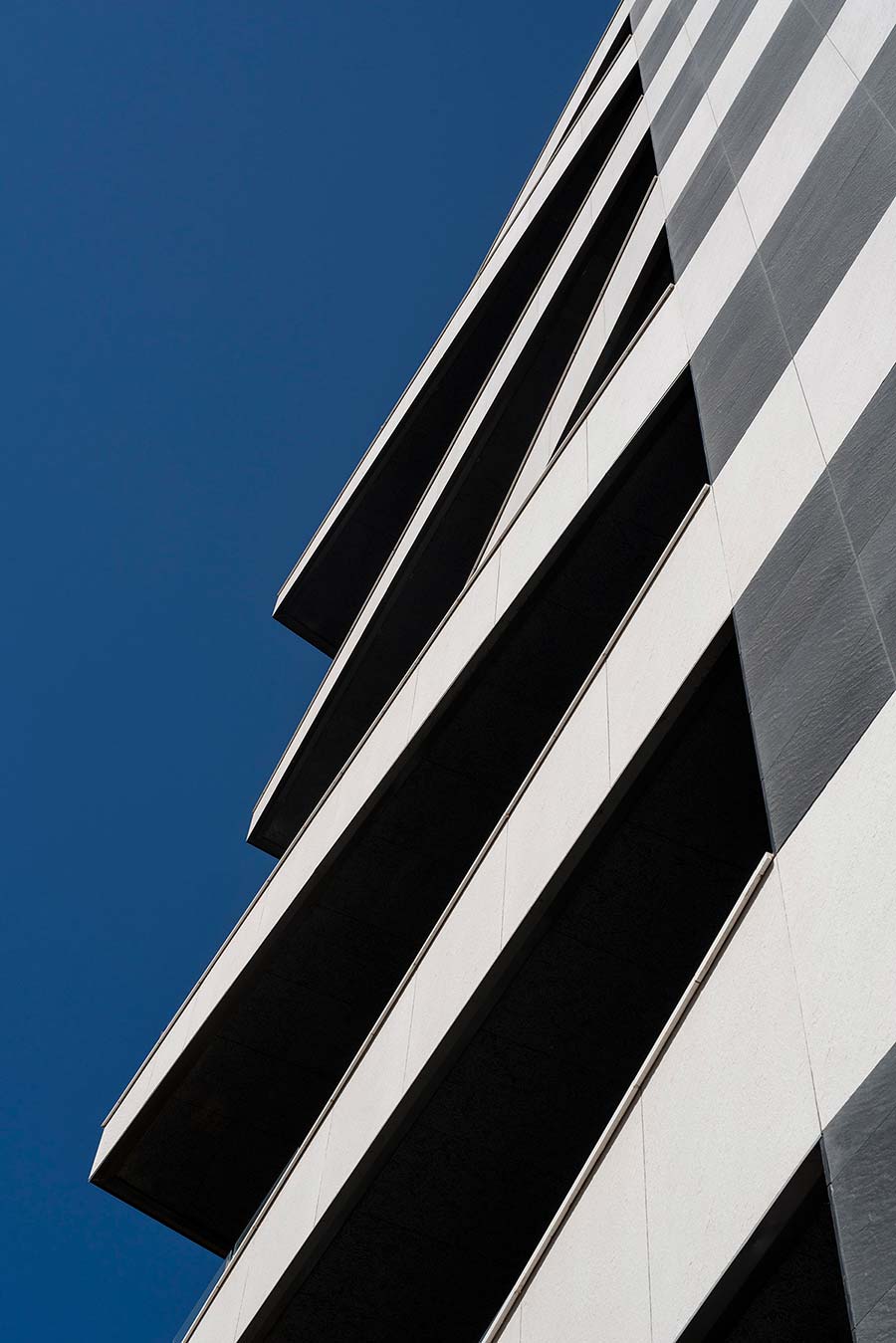 Photo #5 of project Geometric cuts for a standout facade