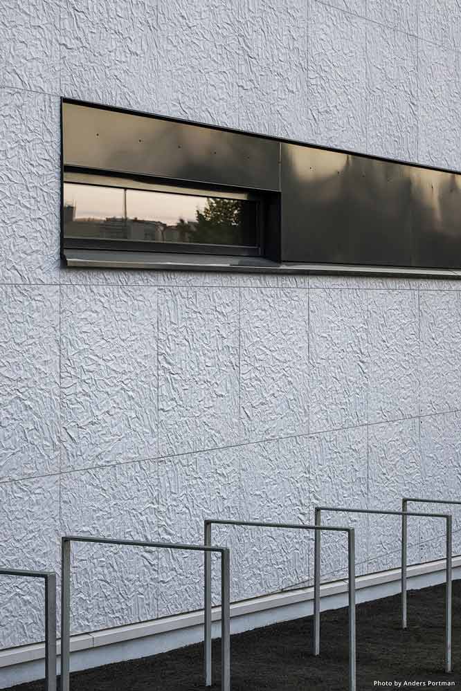 Photo #3 of project What better than a paper-like texture for a library's facade