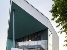 Paperaren itxura duen testura bat liburutegi bateko fatxadarako proiektuko 4. argazkia