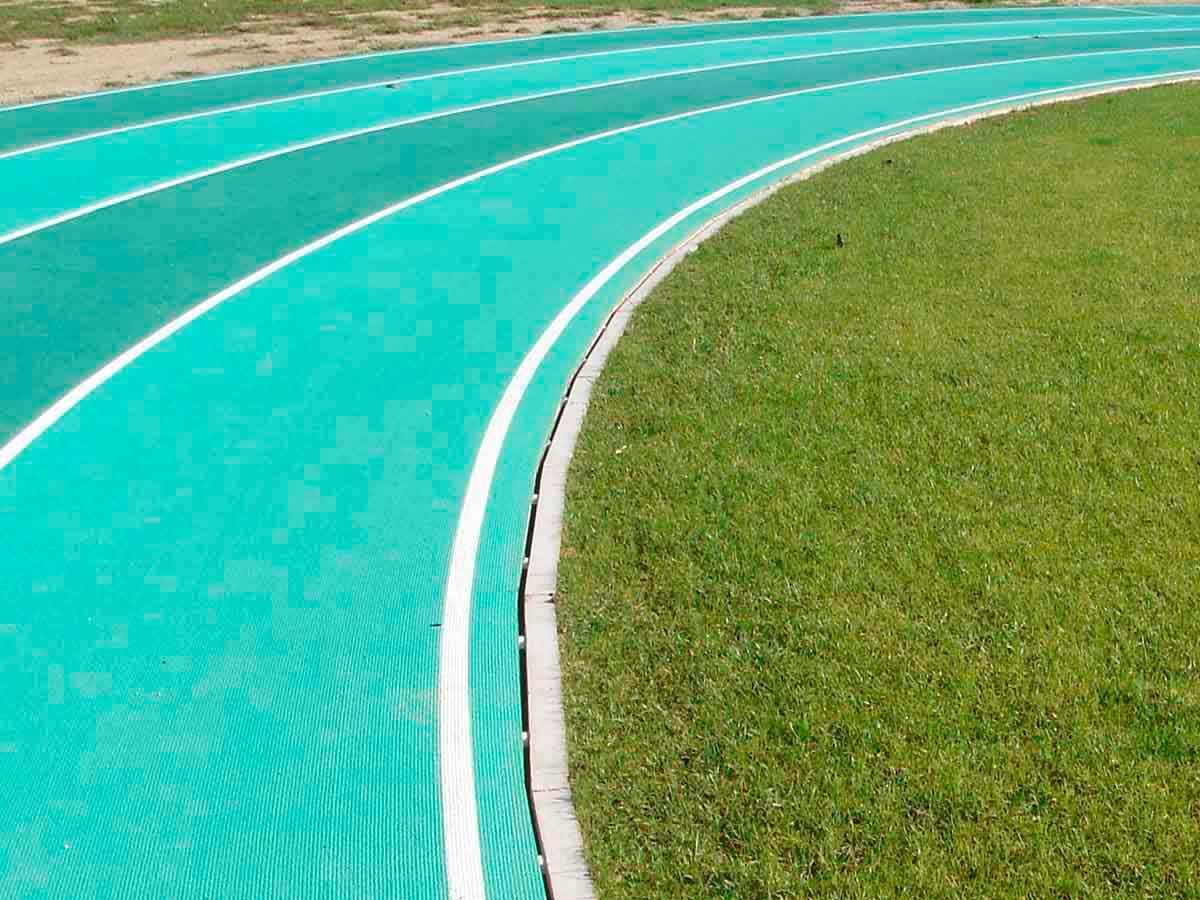Canal de drenagem oculto para pista de atletismo