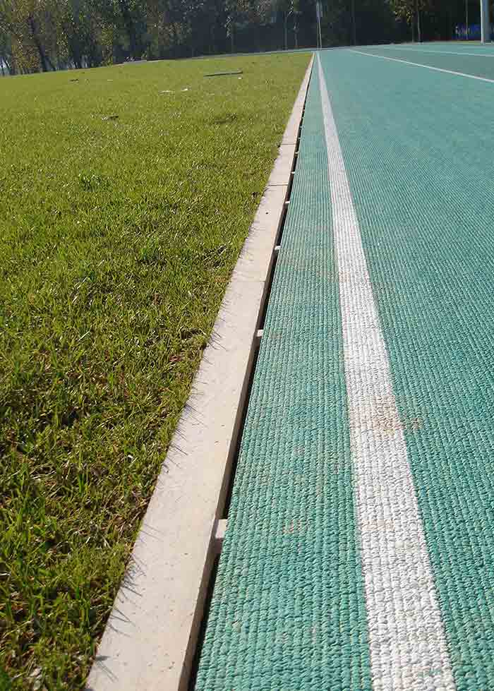 Foto 3 do projeto Canal de drenagem oculto para pista de atletismo